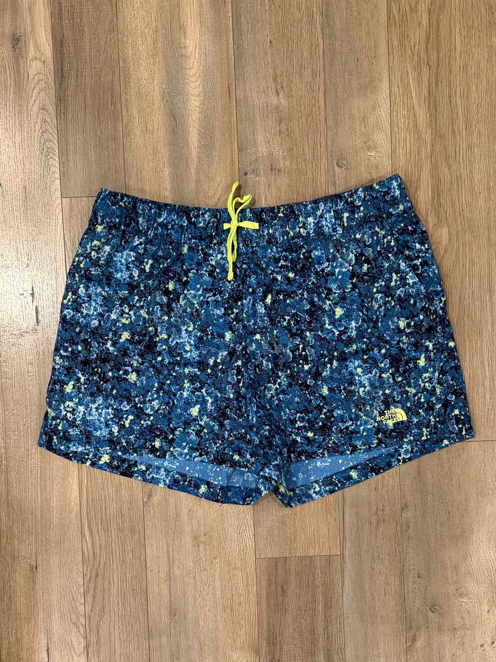 The North Face Women's Blue Patterned Athletic Shorts with Yellow Drawstring